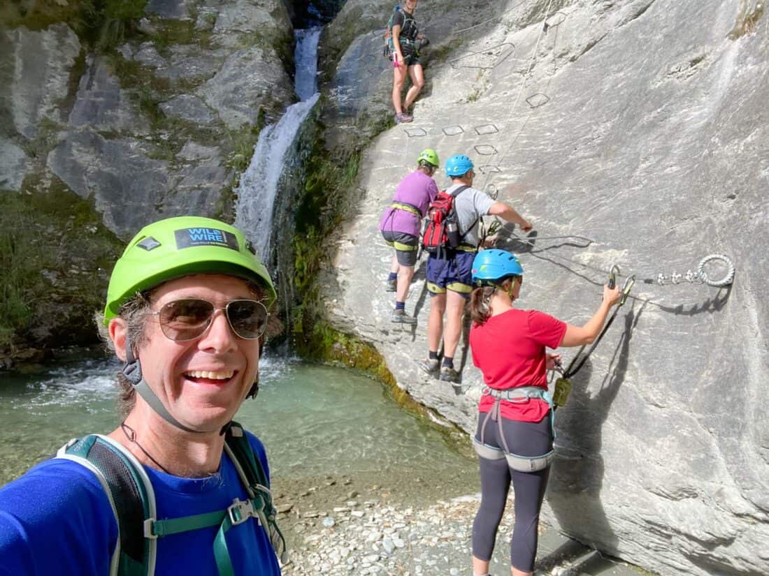 Climbing a waterfall with Wildwire Via Ferrata in Wanaka