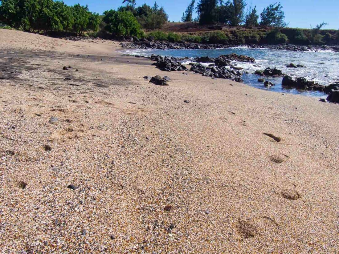 Colourful sea glass on Glass Beach in Kauai