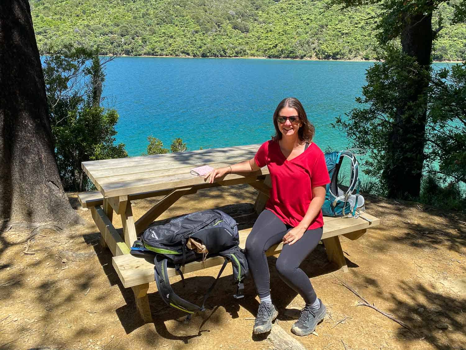 Erin wearing Lululemon Wunder Under tights and Bluffworks t-shirt on Queen Charlotte Track