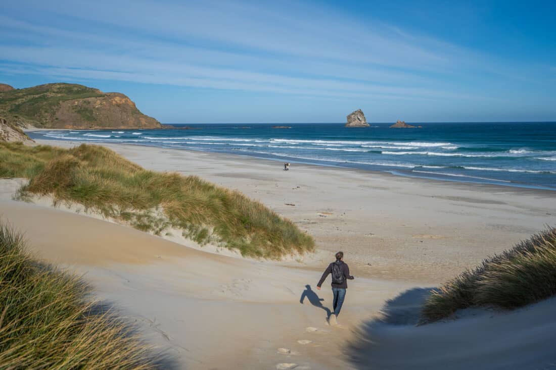 Simon running down the dunes at Sandfly Bay on the Otago Peninsula
