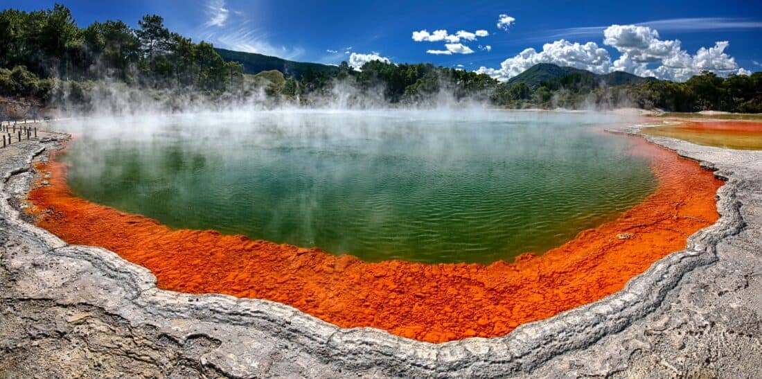 Green and orange Champagne Pool at Wai o Tapu Geothermal Park in the North Island of New Zealand