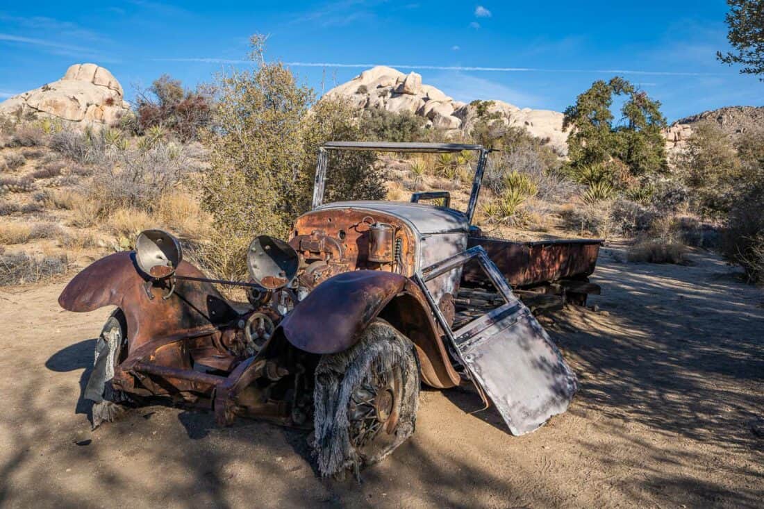 Rusty old car at Wall Street Mill in Joshua Tree, California