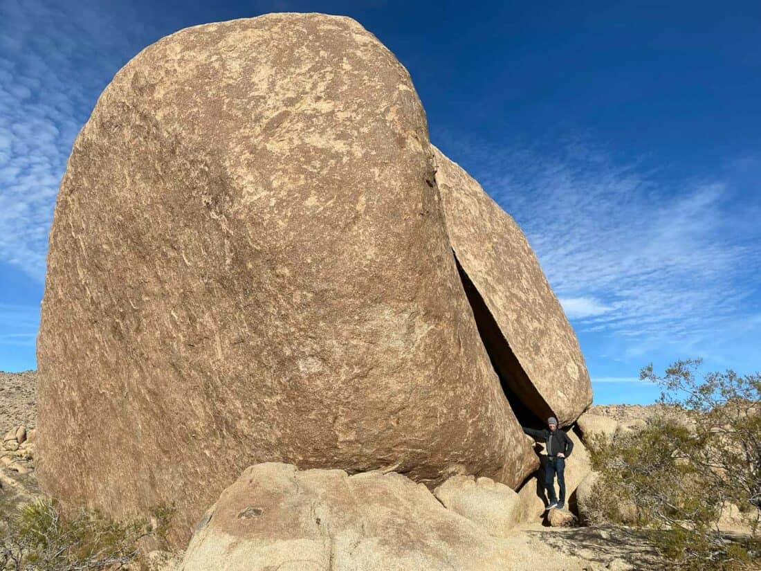 Simon standing at Split Rock in Joshua Tree