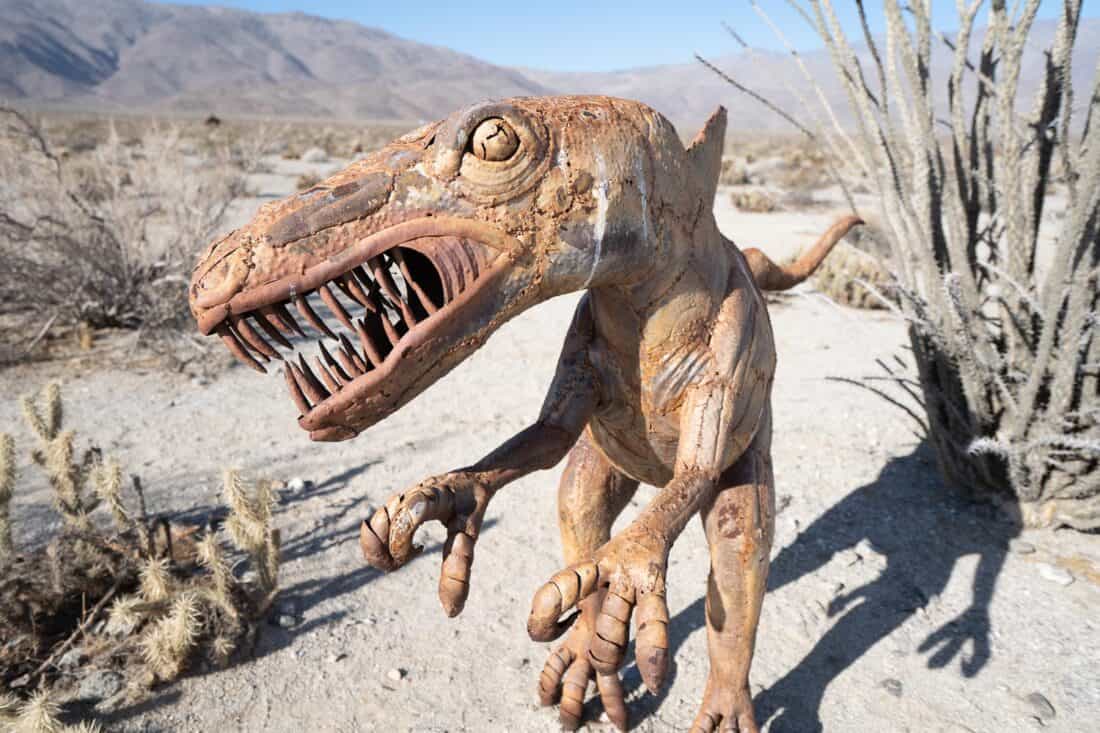 Baby Spinosaurus dinosaur sculpture in Anza Borrego desert park, California, USA