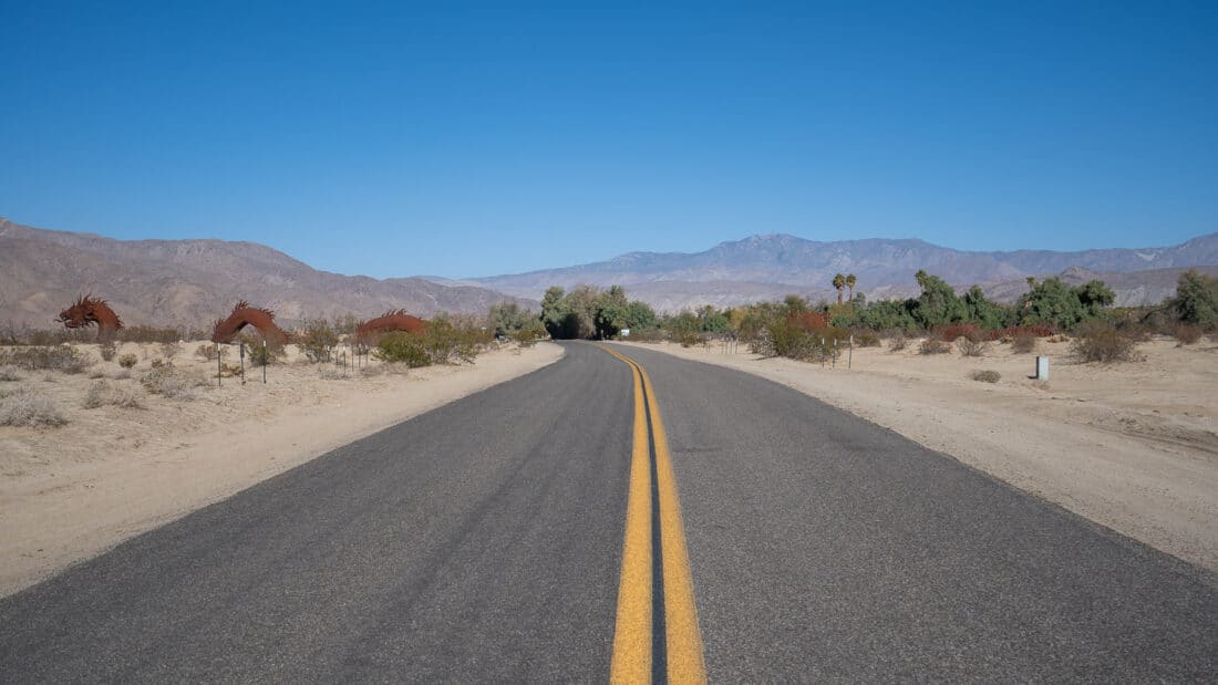 The Borrego Springs dragon or serpent diving under the road, California, USA