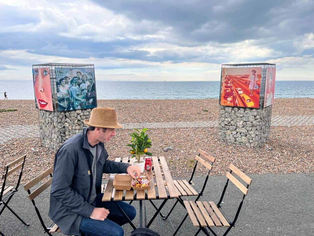 Eating at Potato Box food truck on Worthing seafront