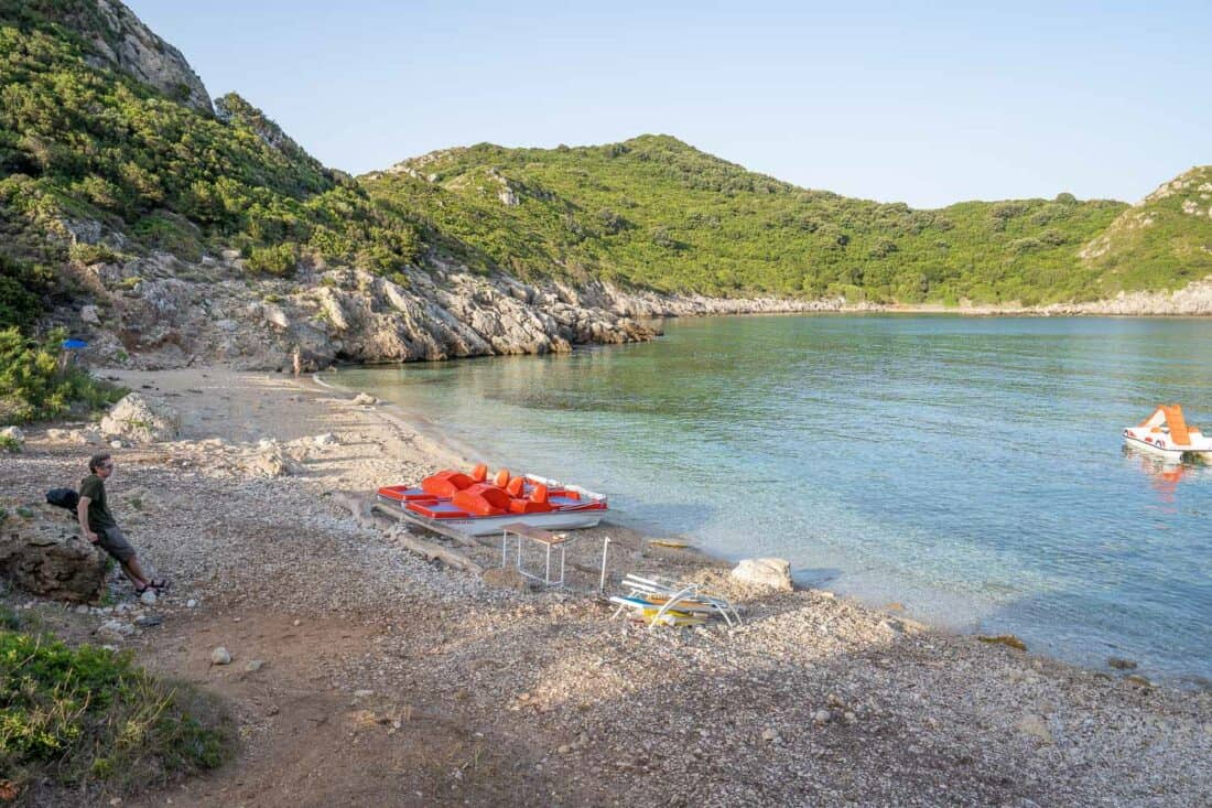 Porto Timoni beach in shade early in the morning, Corfu