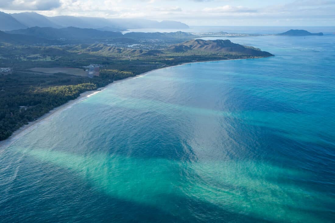 Waimānalo Beach from above on a doors off Oahu helicopter ride