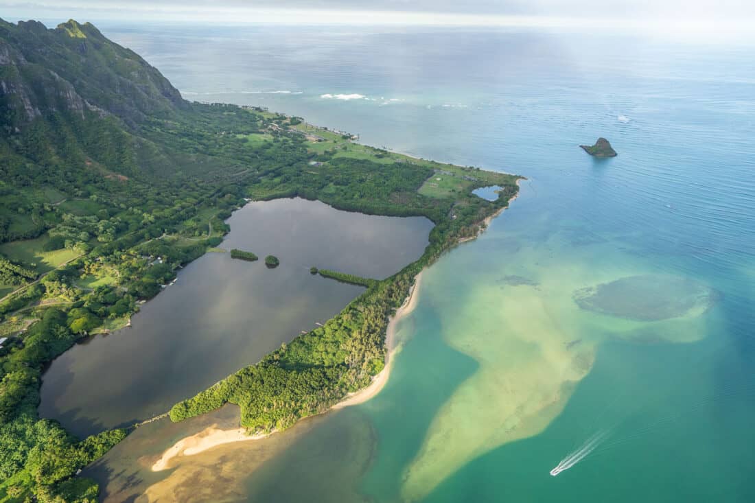 Kaneohe Sandbar, Mokoli’i Island, Kualoa Ranch, and Kualoa Regional Park on Oahu from a helicopter