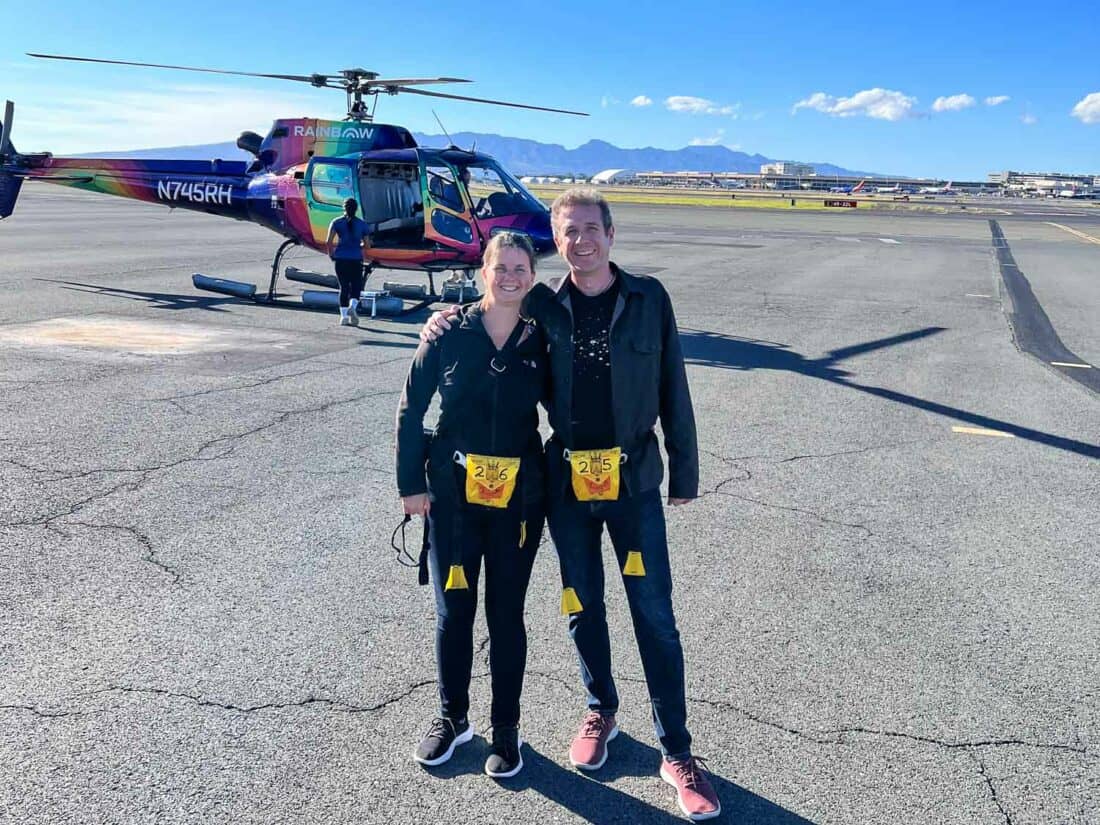 Erin and Simon in front of Rainbow Helicopters on a doors off Oahu helicopter ride