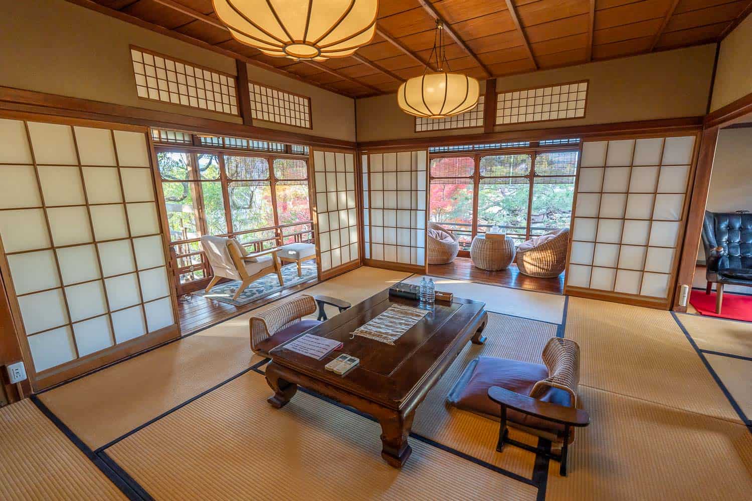 Suite overlooking maple trees at Nanzenji Ryokan Yachiyo in Kyoto, Japan