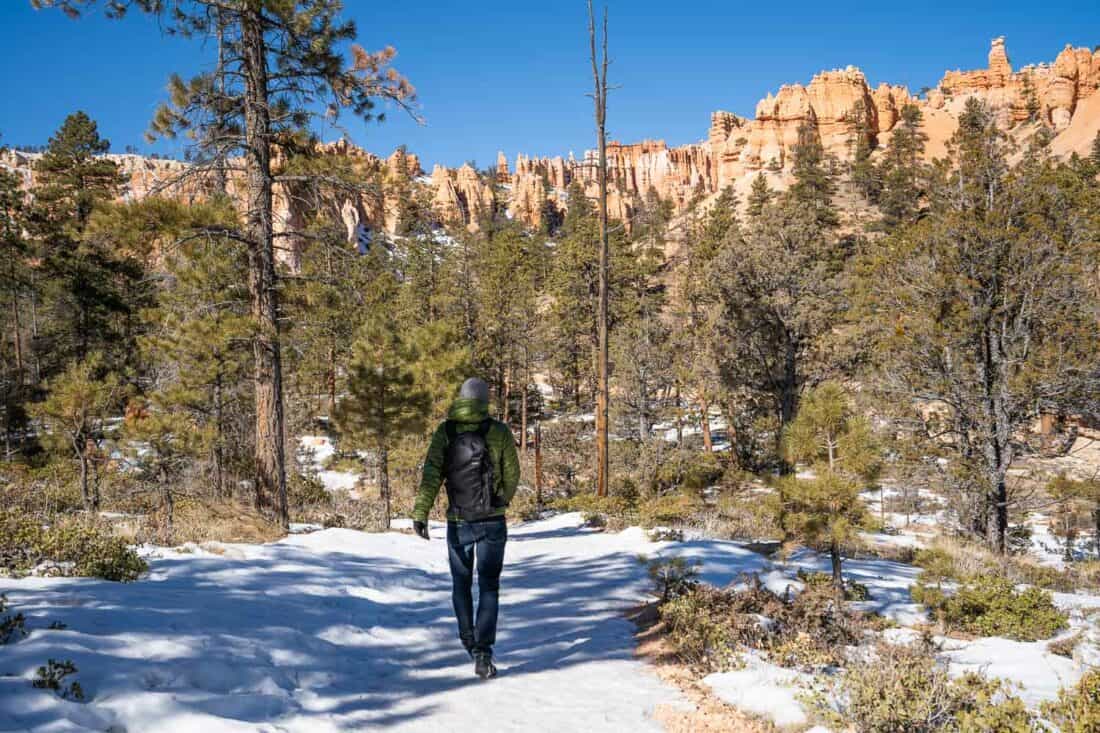 Simon hiking in Bryce Canyon National Park in the snow, Utah, USA