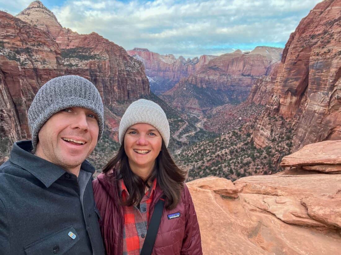 Erin and Simon at the Canyon Overlook, Zion National Park with panoramic views of the canyon, Utah, USA