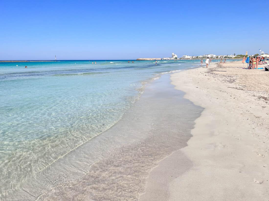 Lovely white sand beach with crystal clear waters at Torre San Giovanni, Salento, Italy