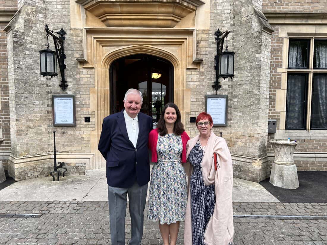 Erin's dad, Erin, and Erin's mum in front of Foxhills