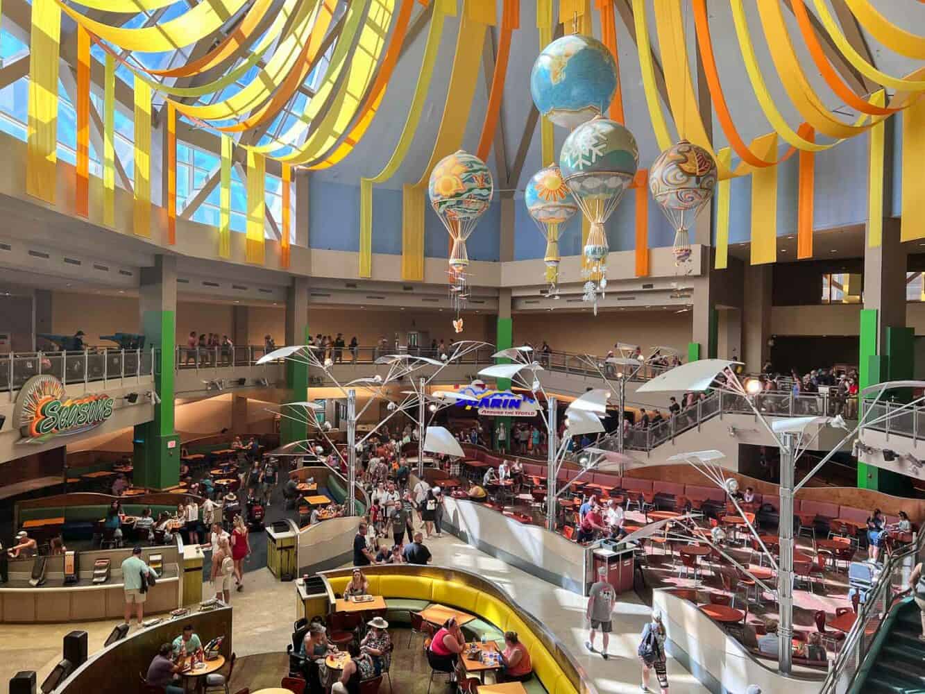 Busy forecourt and entrance to the Soarin' Around the World ride in Epcot, Disney World Florida