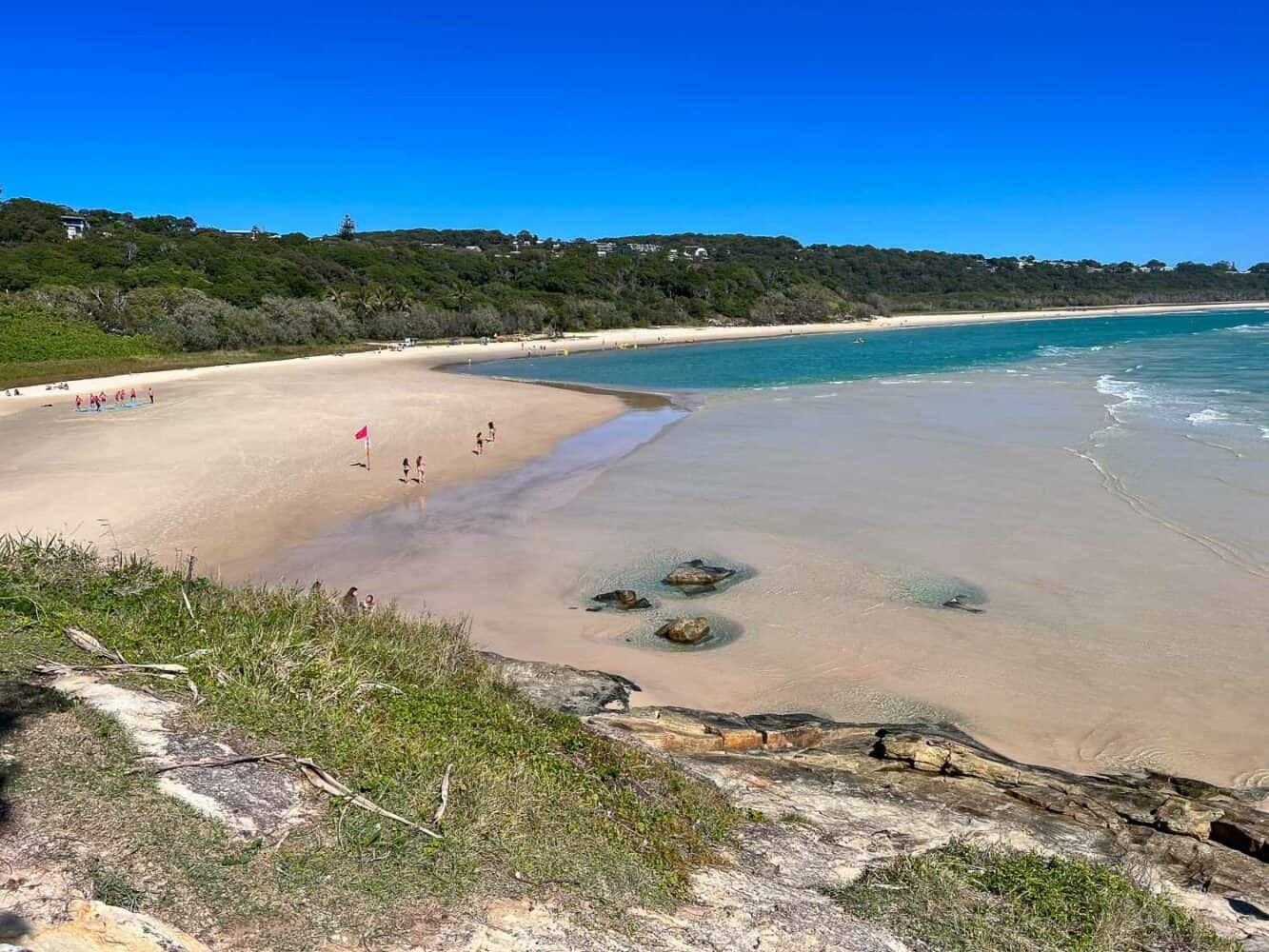 Clear shallow waters at Cylinder Beach, North Stradbroke Island, Queensland, Australia