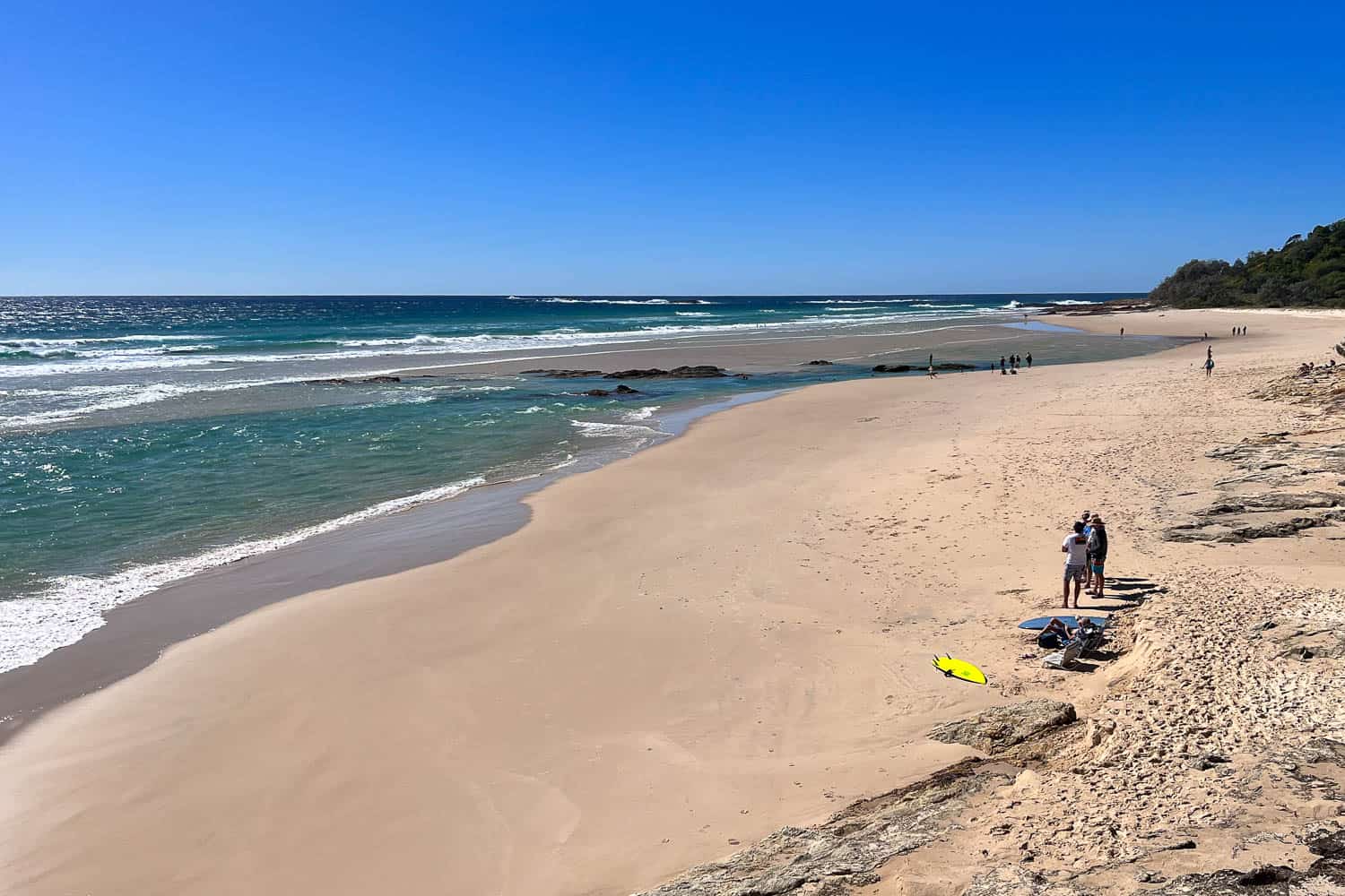 Expansive flat sands of Deadman's Beach, North Stradbroke Island, Queensland, Australia