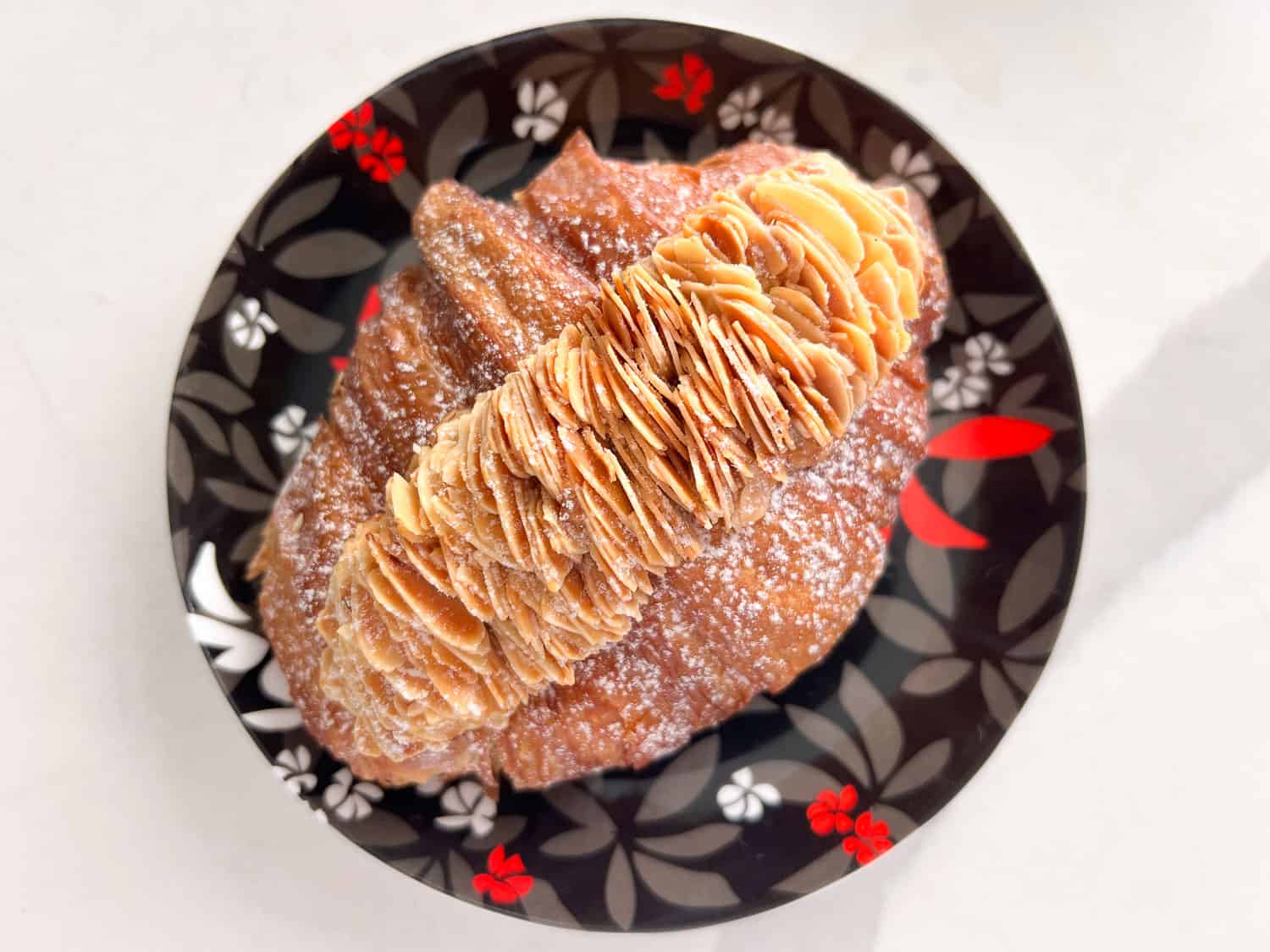 Decadent almond croissant at Lune Croissanteri, Brisbane, Australia