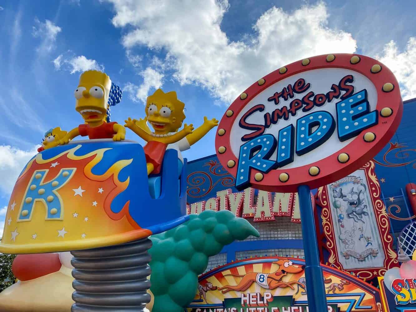 Giant Bart and Lisa at the  entrance to The Simpsons Ride, Universal Orlando, USA