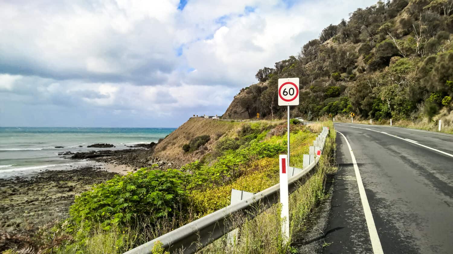 Great Ocean Road hugging the coastline,. Victoria, Australia