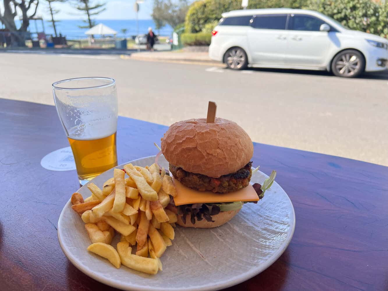 Lentil and chickpea burger with chips and beer, Moffat Beach Brewing Co, Caloundra, Queensland, Australia
