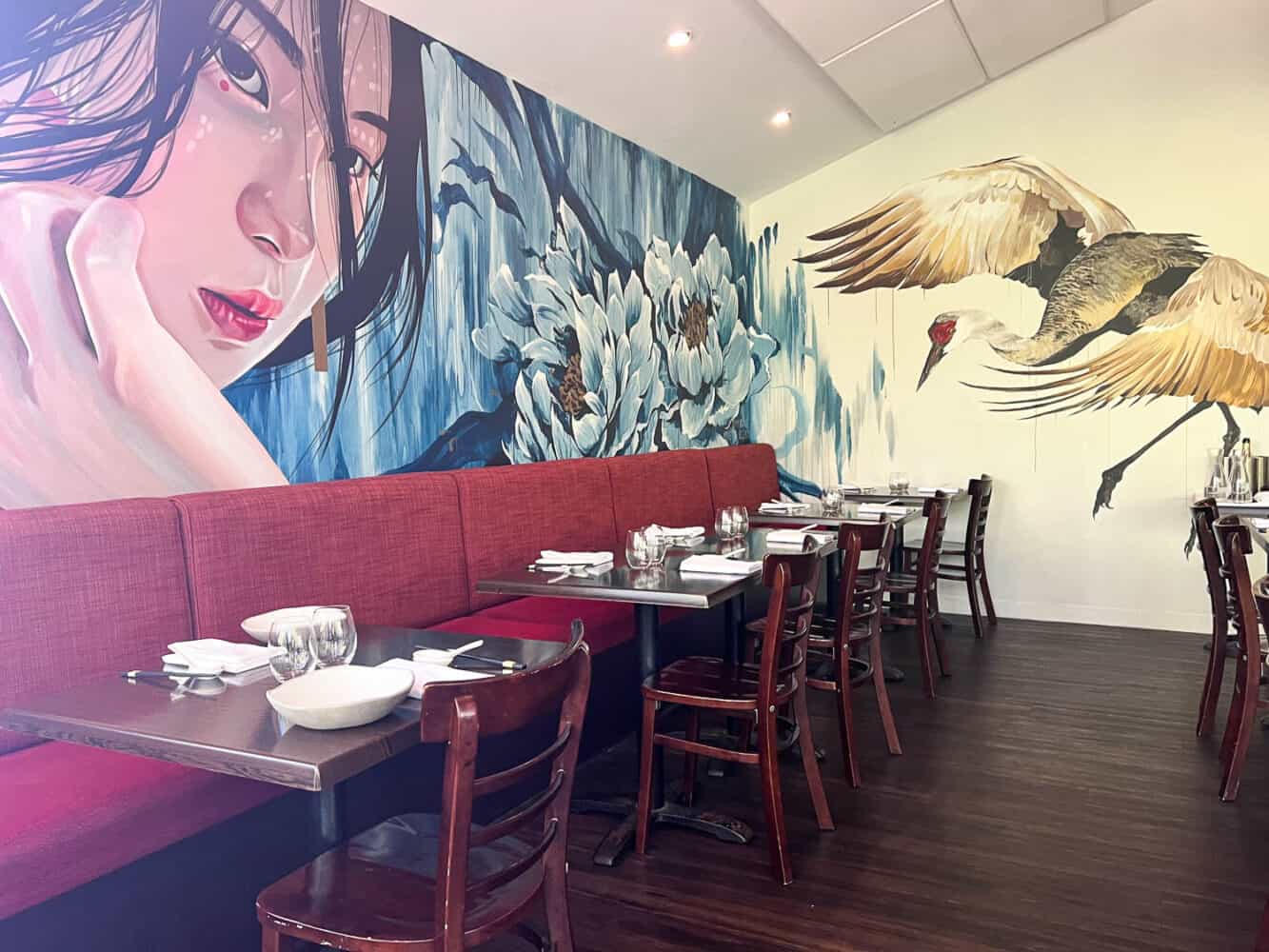 Stylish interior with painted murals in Embassy XO, Noosa, Queensland, Australia