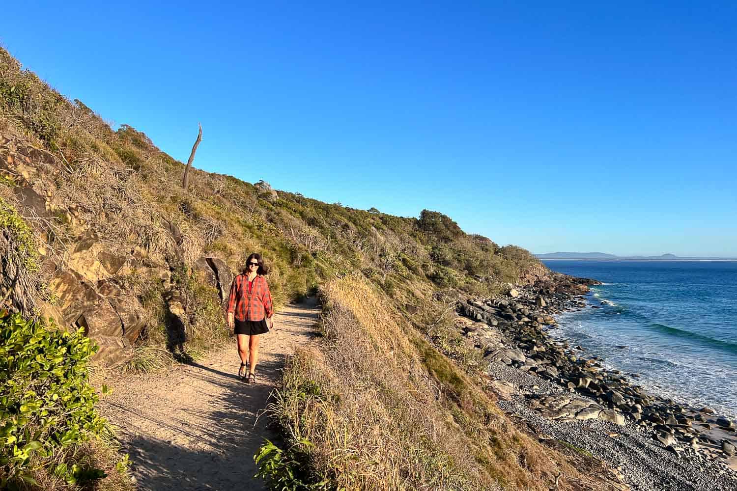 Erin on the path towards Granite Bay, Noosa National Park, Queensland, Australia