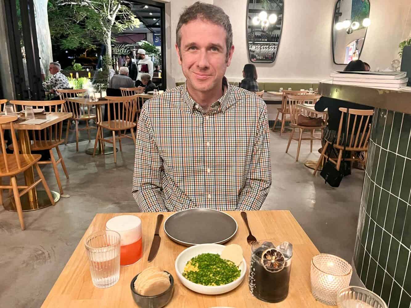 Simon dining at Herbet, Noosa, Queensland, Australia