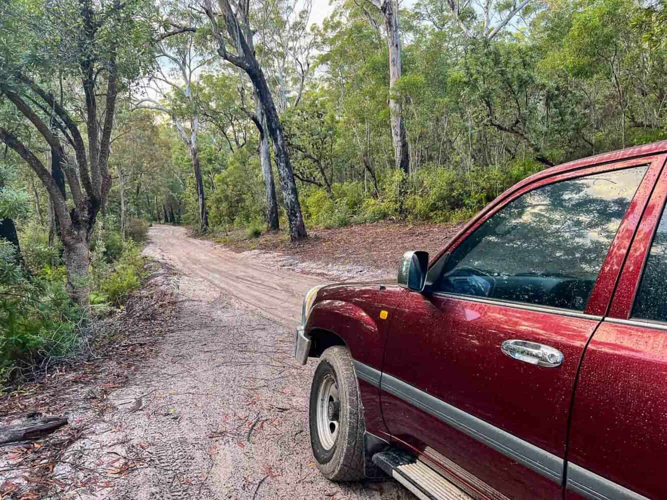 Driving a 4WD in K'gari, Queensland, Australia