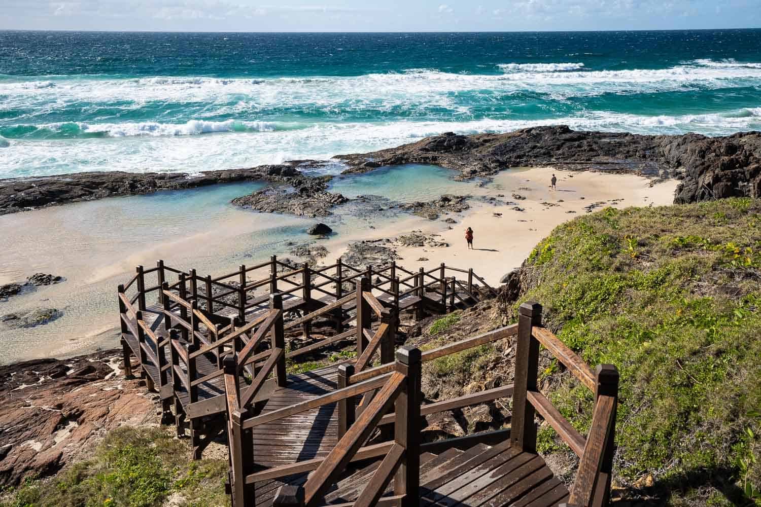 Wooden stairs leading down to Champagne Pools, Queensland, Australia