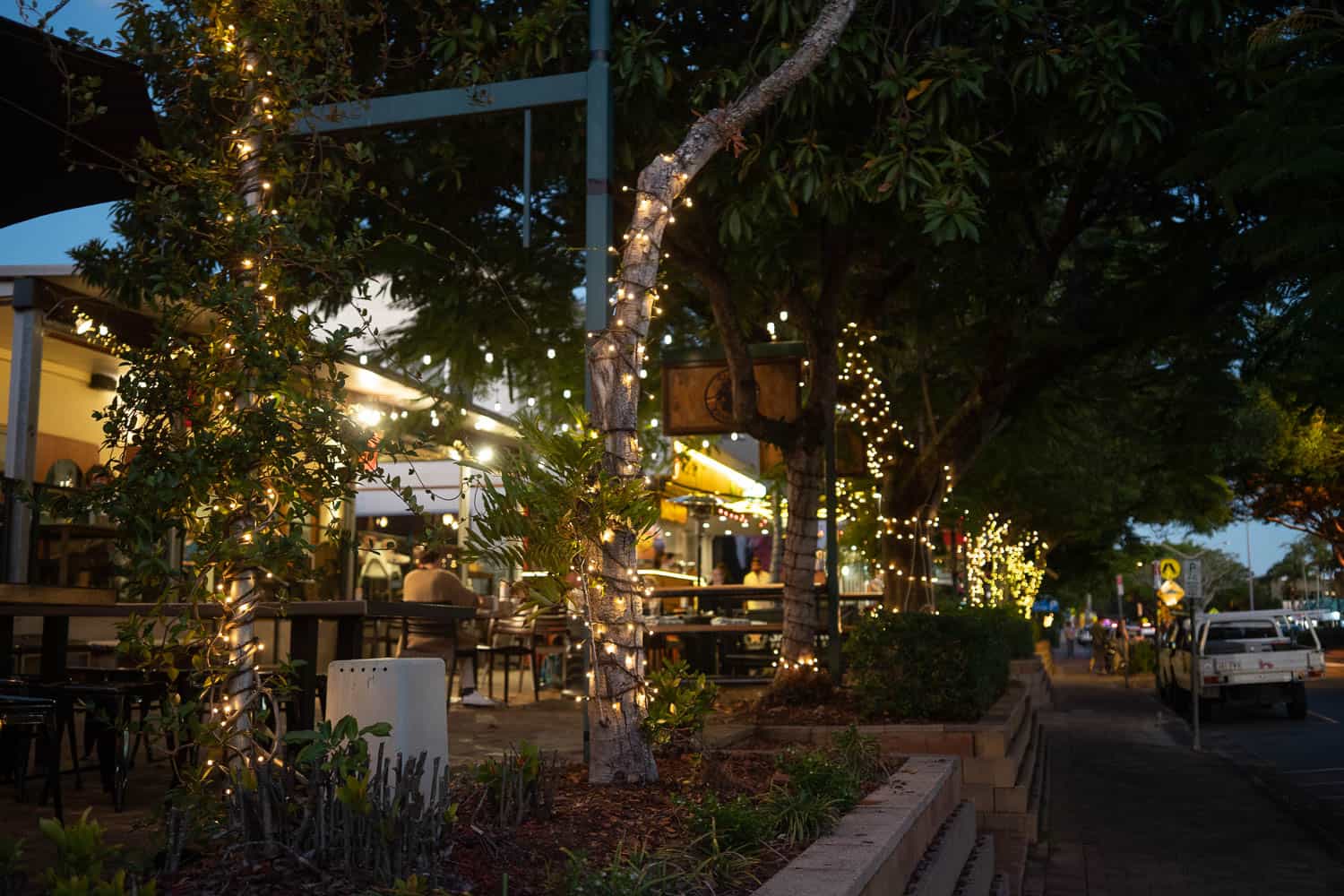 Illuminated restaurant terraces in Noosa Junction, Noosa, Queensland, Australia