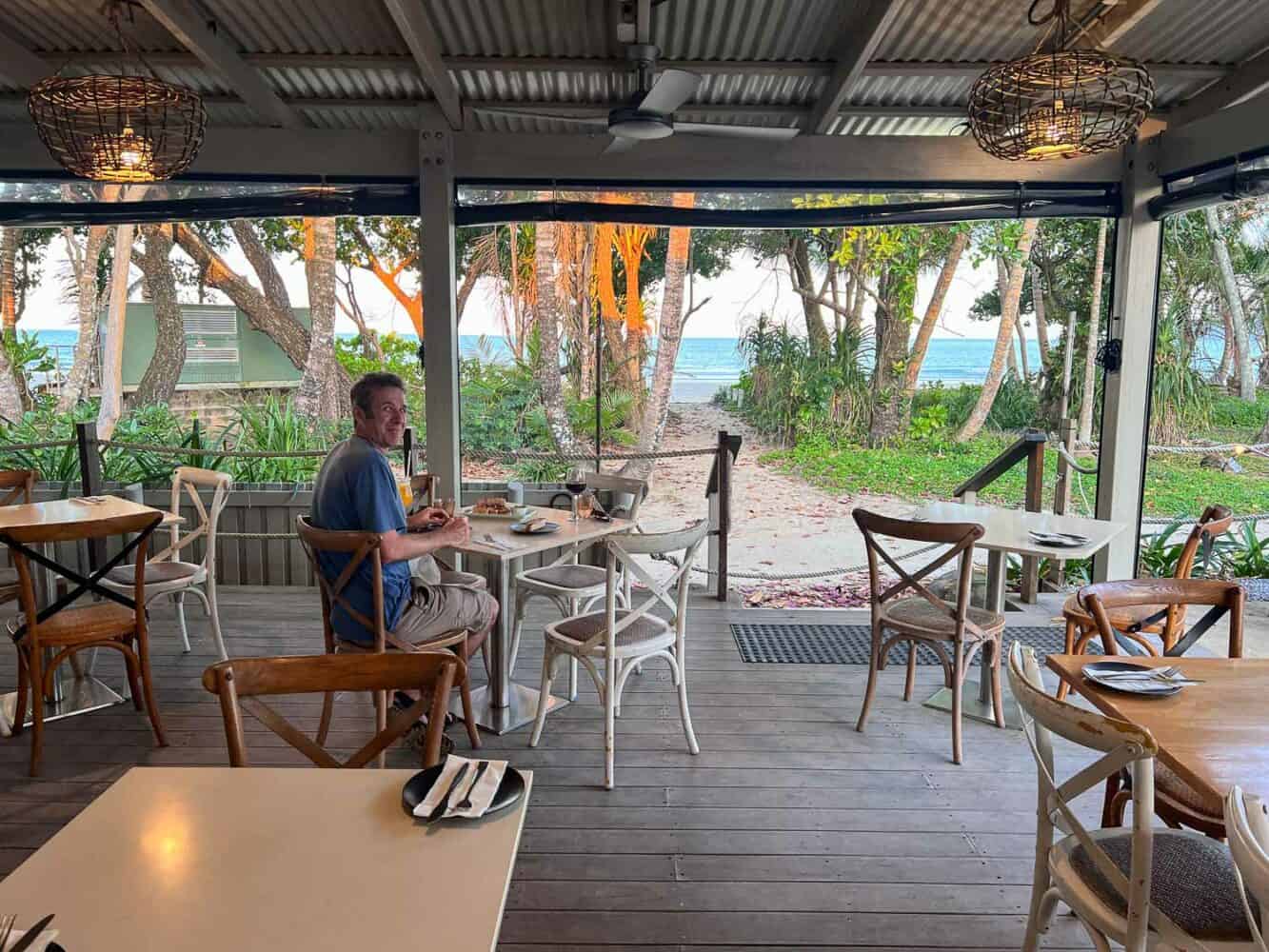 Simon enjoying a meal at Plenty Restaurant, Mission Beach, North Queensland, Australia