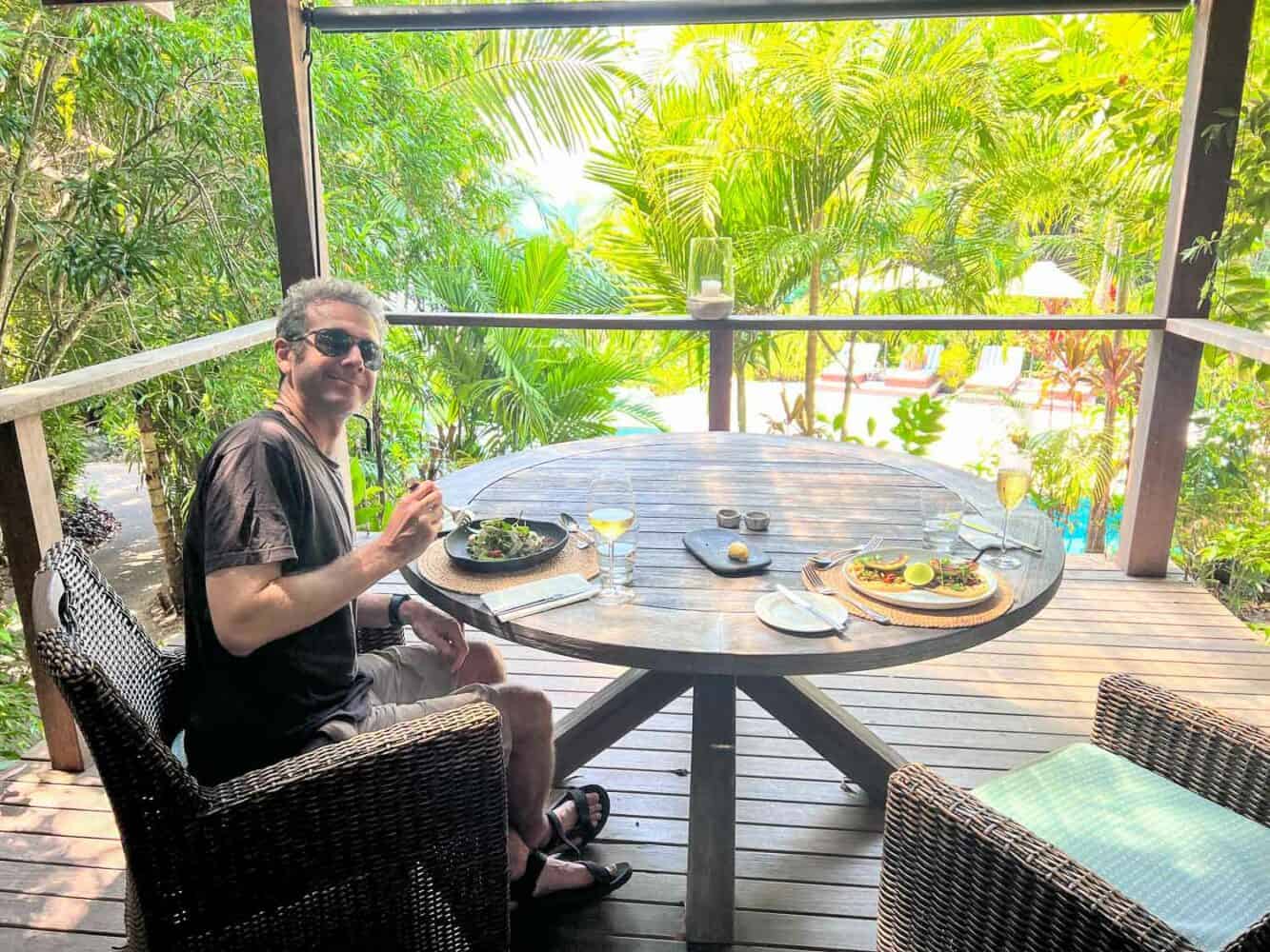 Simon enjoying a meal in the private dining area at Bedarra Island Resort restaurant, Queensland, Australia 