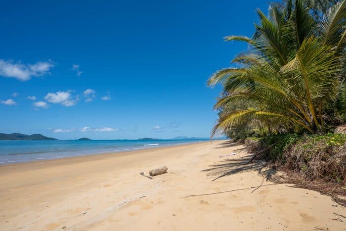 The golden sand of Wongaling Beach, one of the best things to do in Mission Beach Queensland