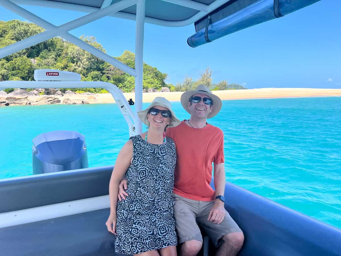 Erin and Simon travelling to Wheeler Island from Bedarra Island Resort by boat, Queensland, Australia