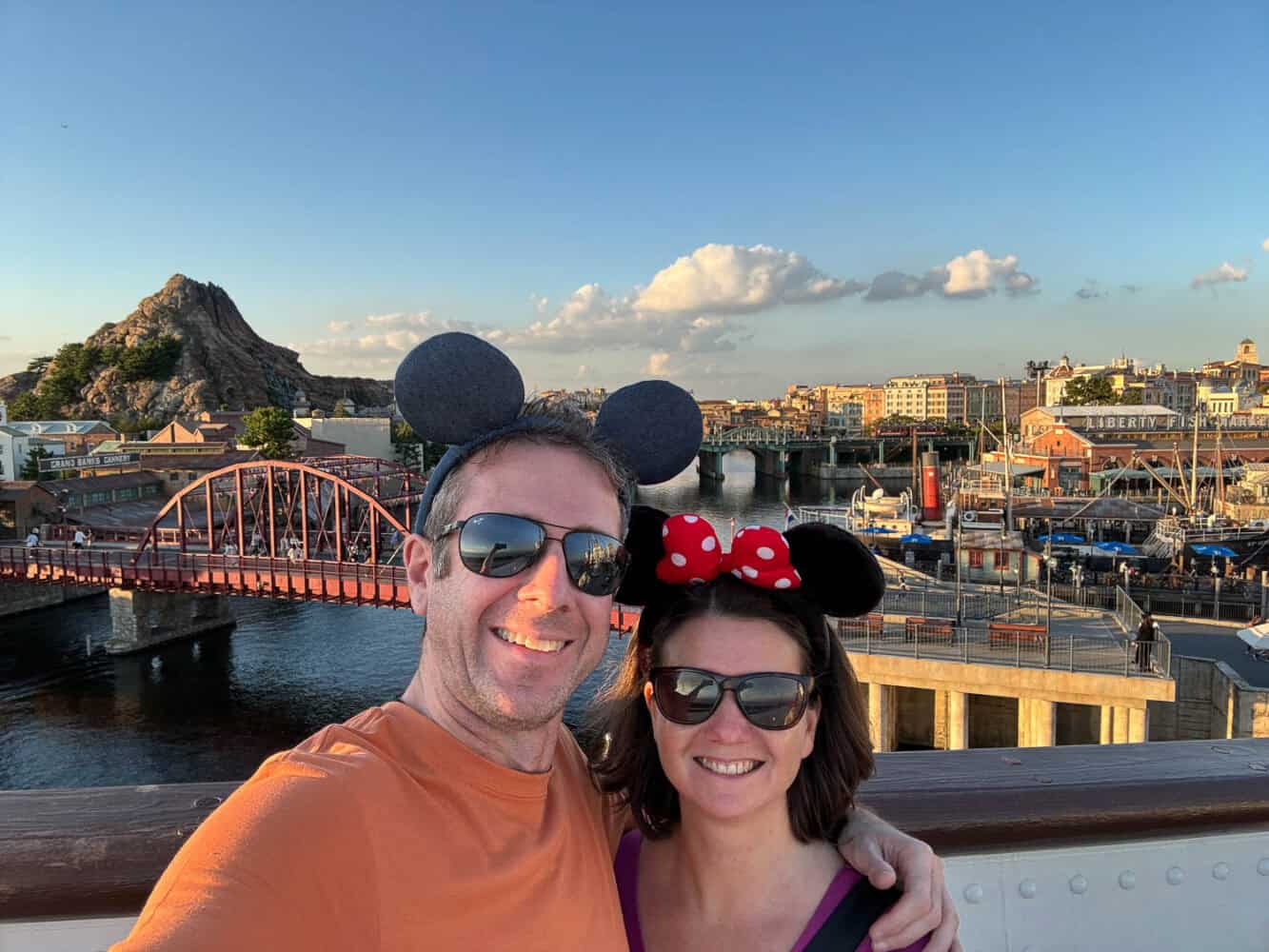 Simon and Erin on the upper deck of the SS Columbia with views of DisneySea