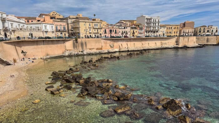 Cala Rossa beach in Ortigia in Syracuse, Sicily in Italy.