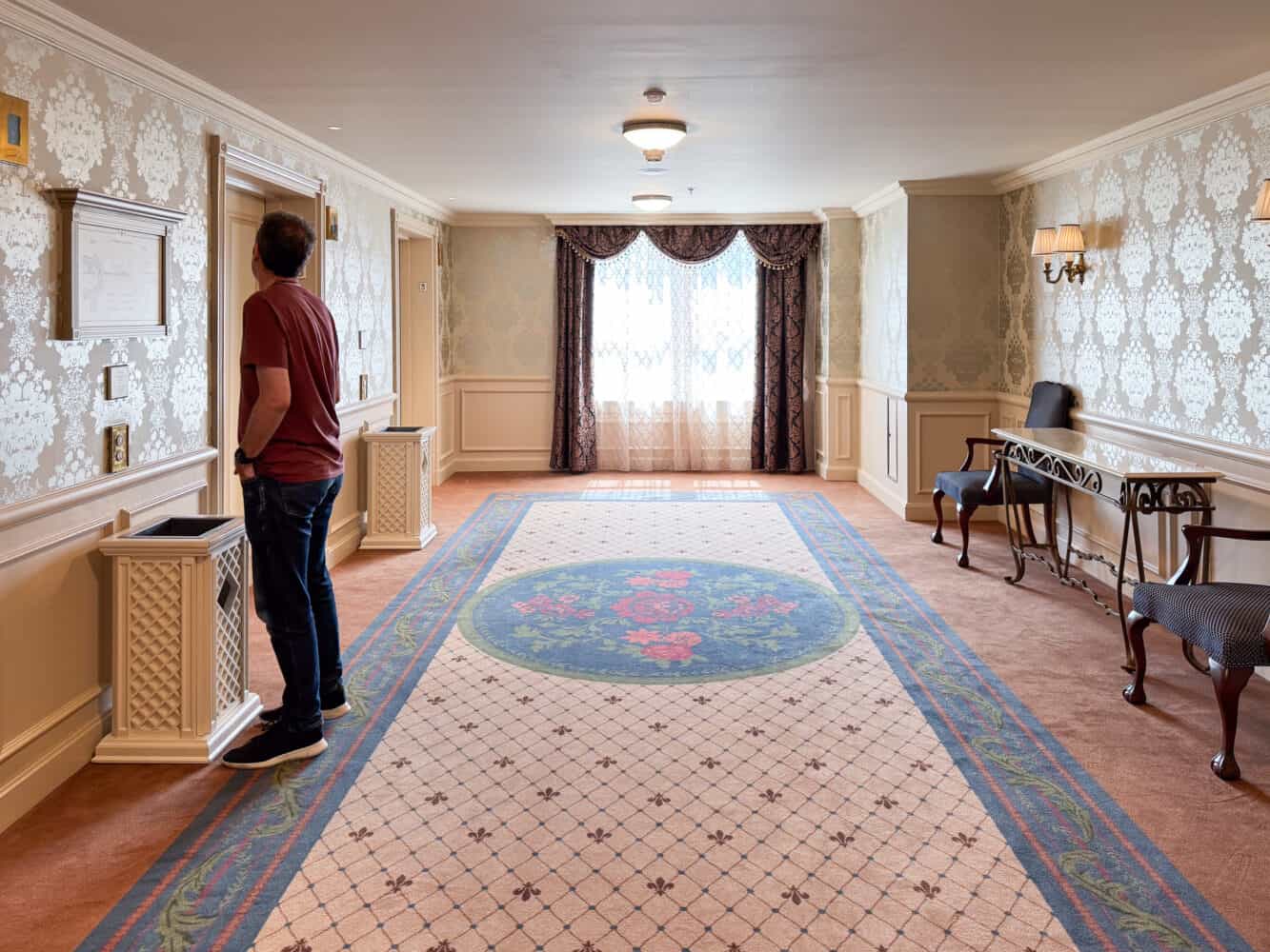 Simon waiting for the lift at Disneyland Hotel Paris
