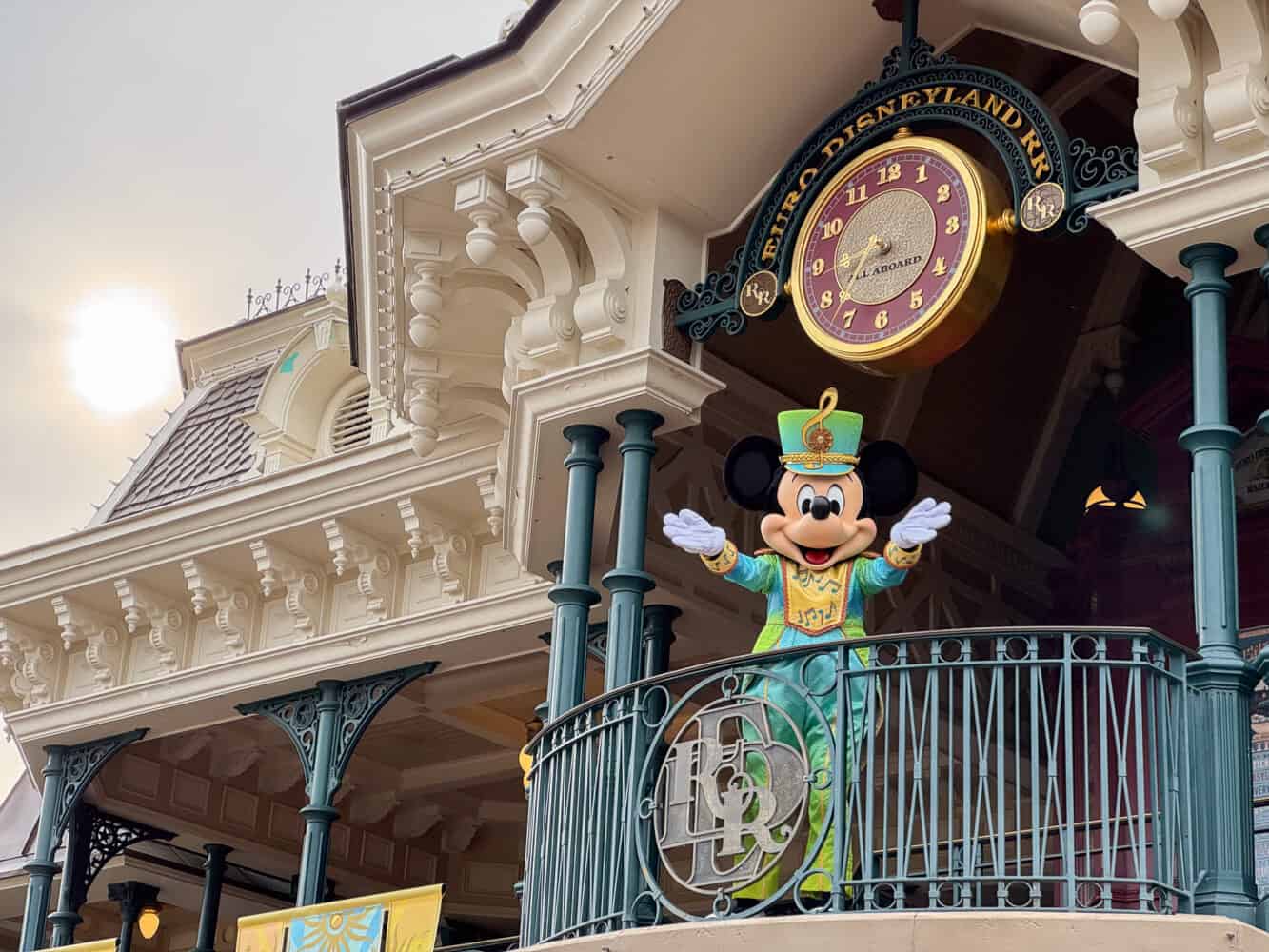 Mickey Mouse greeting guests at Disneyland Park, Paris.