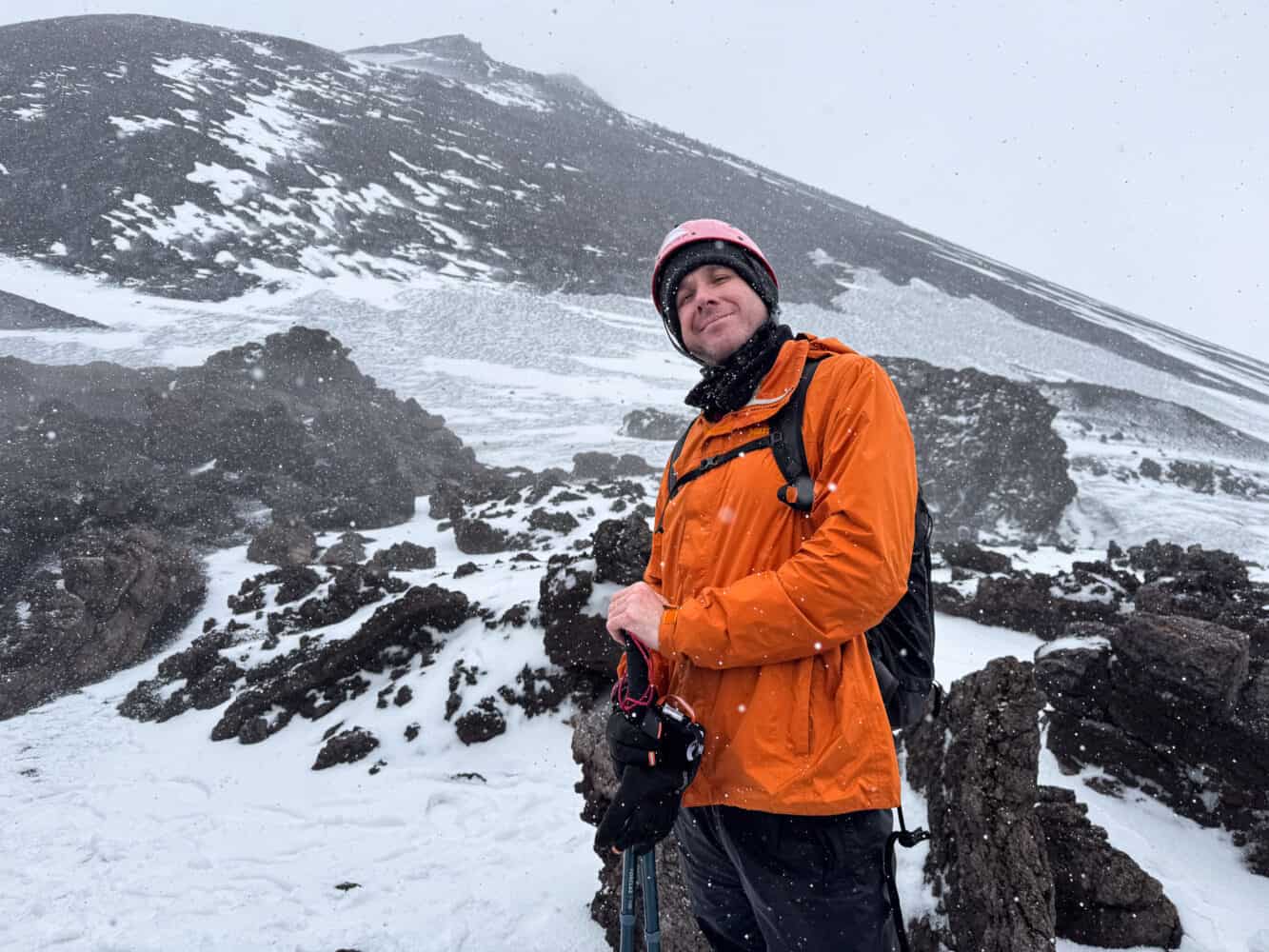 Simon hiking Mt Etna in a snowstorm.