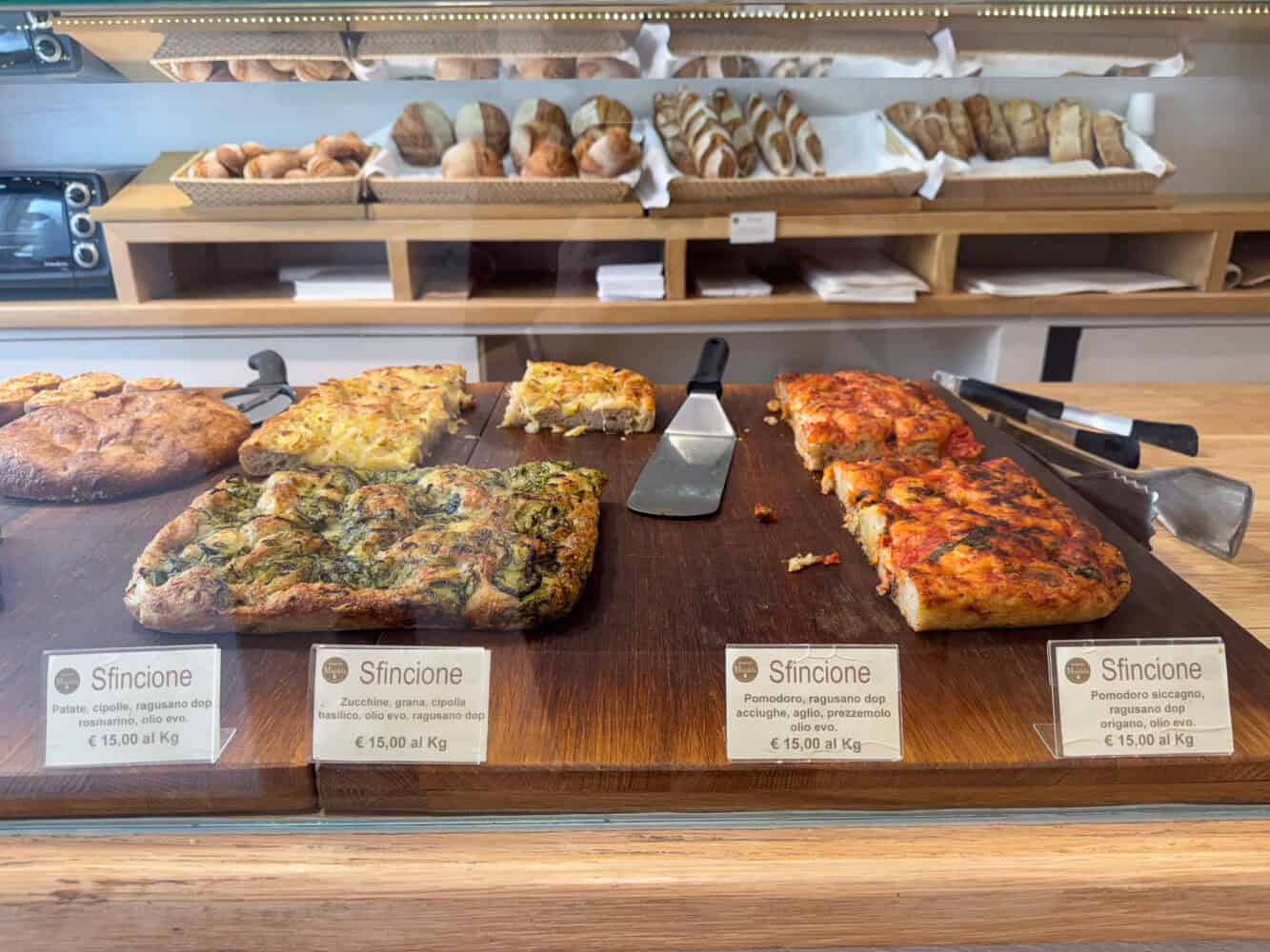 Sfincione selection at bakery Panifico Maidda in Noto, Sicily.