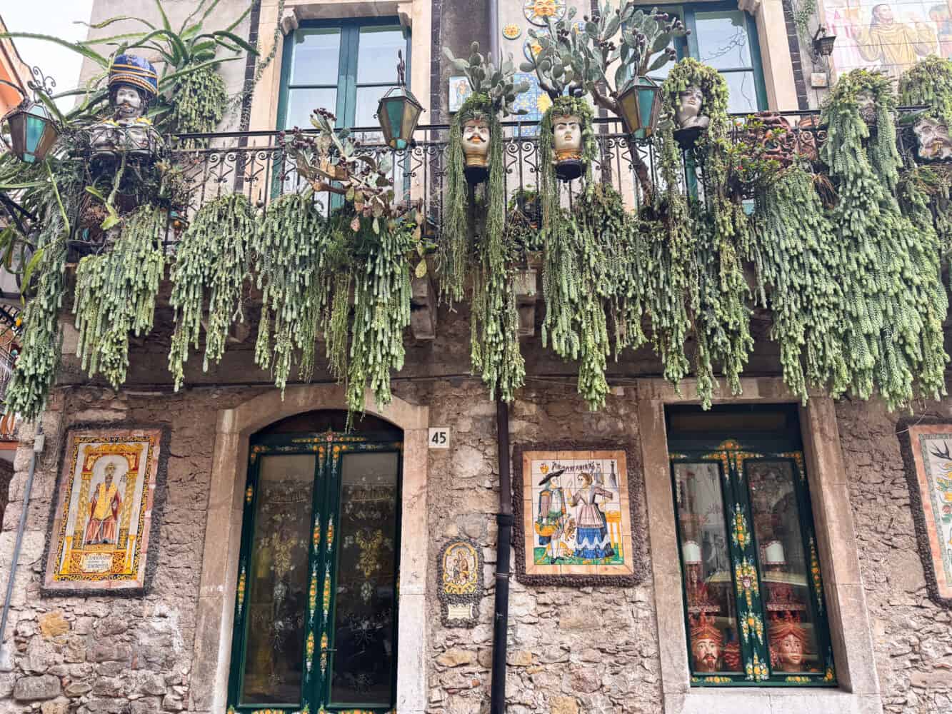 Burro's tail succulents from the balcony above the Giammonarte shop on Via Giardinazzo in Taormina Sicily