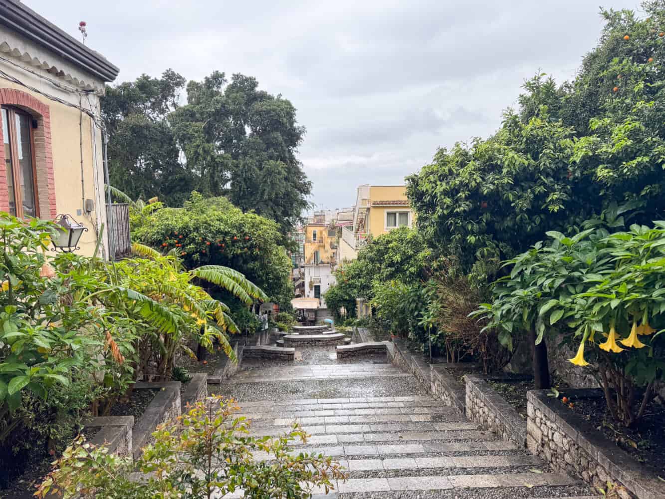 The flower lined staircase on Via Timoleone in Taormina, Sicily