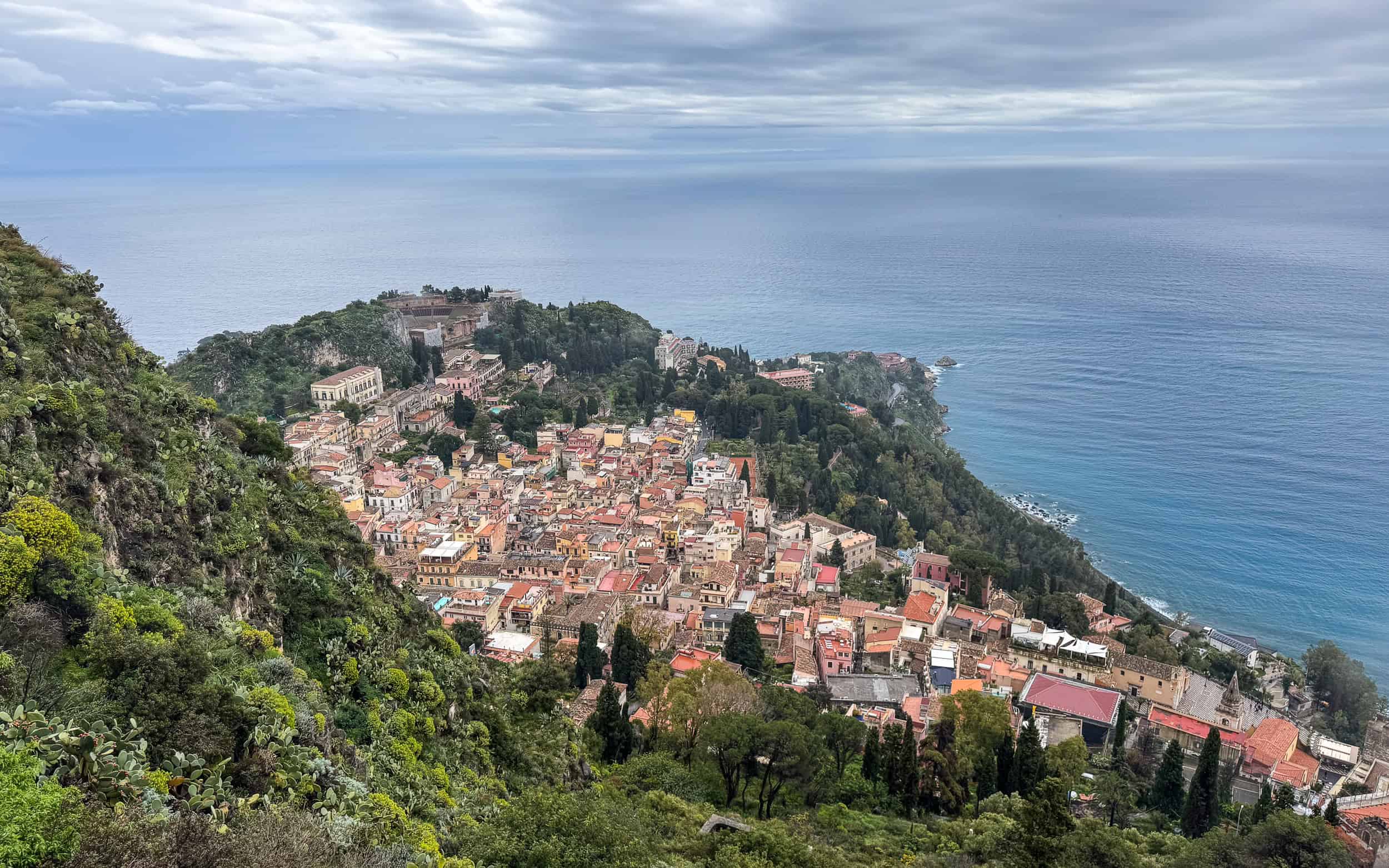 The view of Taormina Sicily from above from Chiesa Madonna della Rocca.