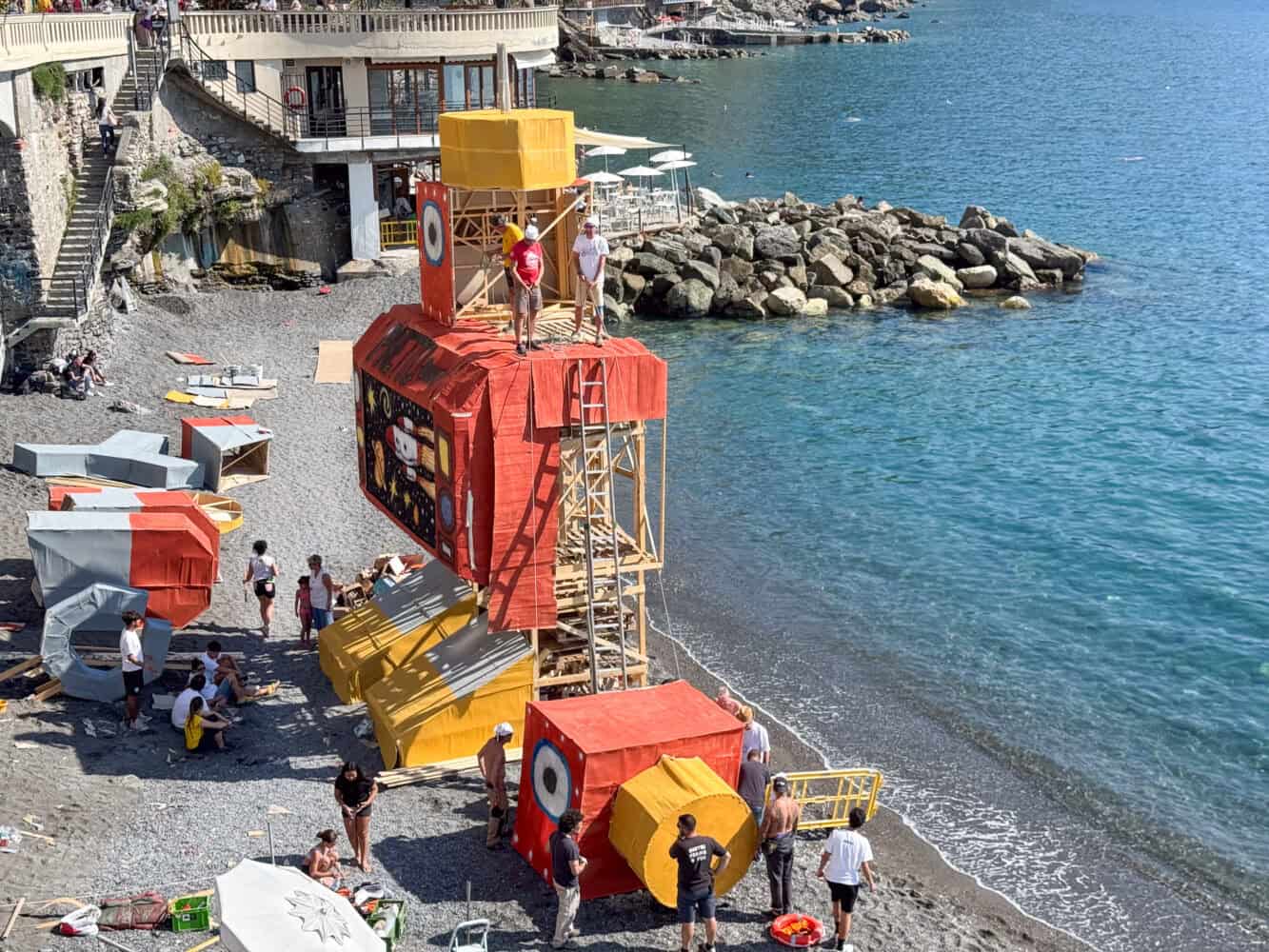 Robot bonfire on Camogli beach during the Camogli Fish Festival.