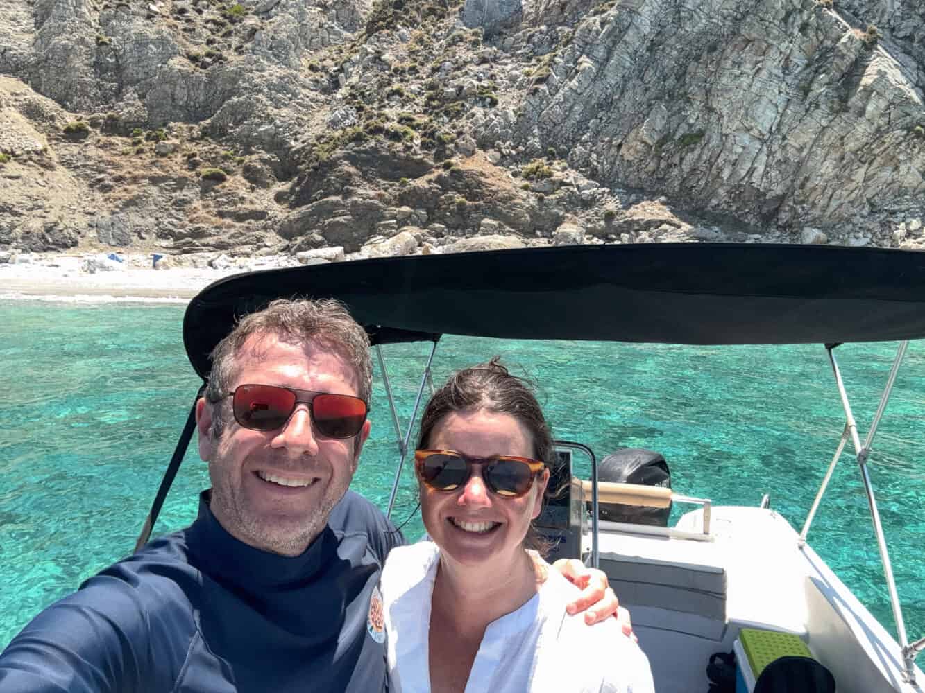 Simon and Erin on their private boat rental in Skiathos, Greece