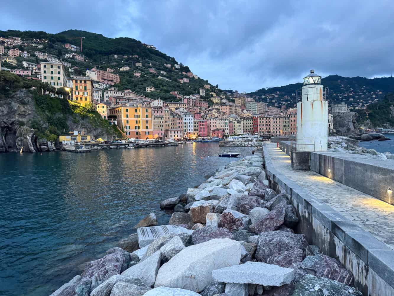 The lighthouse and molo in Camogli at dusk.