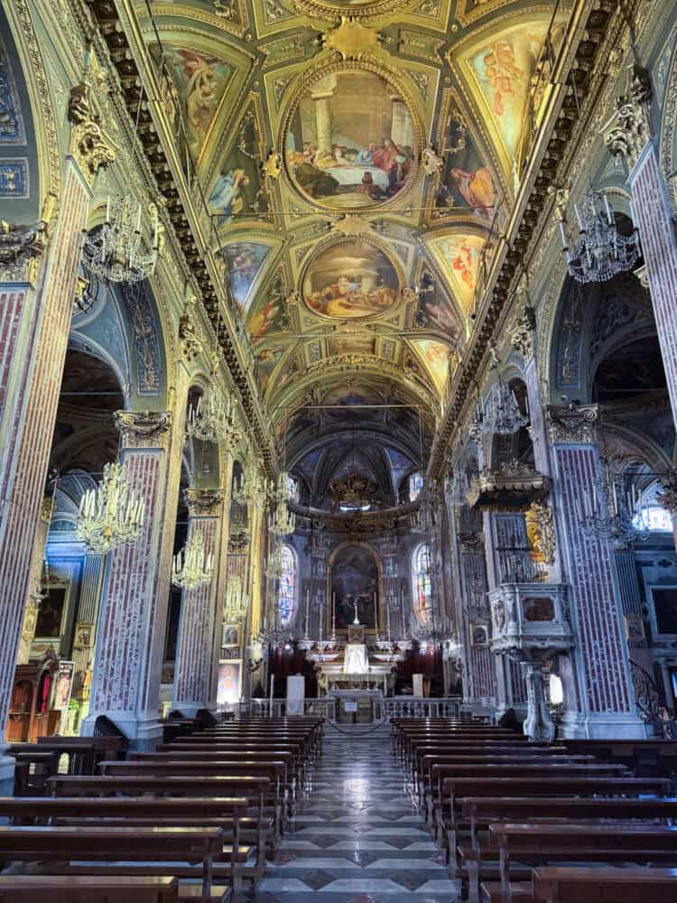 The ornate interior of Basilica di Santa Maria Assunta in Camogli, Italy