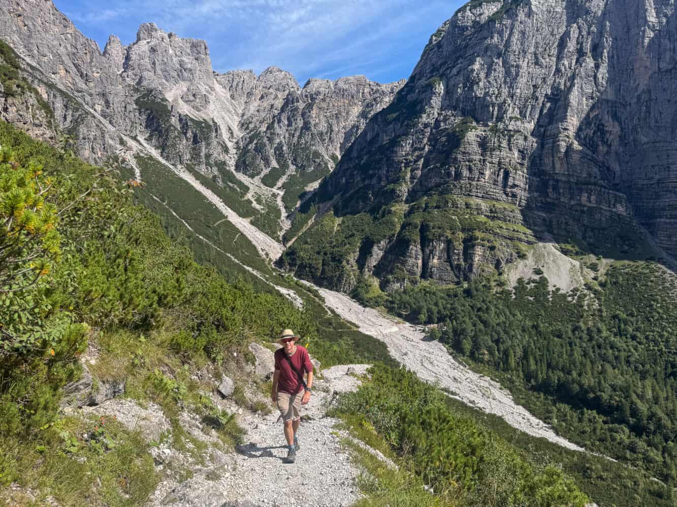 Simon hiking from Rifugio Croz dell'Altissimo to Rifugio Selvata in the Brenta Dolomites, Italy.